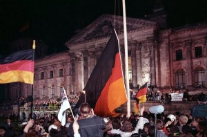 Germans in front of the Reichstag building, 1990.  Via Wikipedia.