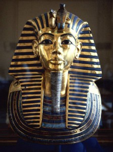The pharaoh's solid gold funerary mask was interred with him in KV62.  Via Wikipedia.