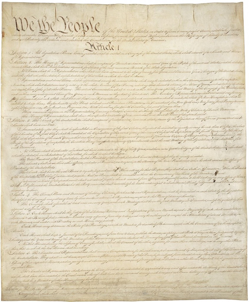 Page one of the original copy of the United States Constitution. Via Wikipedia