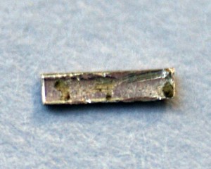 Radium electroplated on a very small sample of copper foil and covered with polyurethane to prevent reaction with the air.