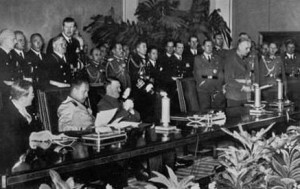Signing of Tripartite Pact by Germany, Japan, and Italy on 27 September 1940 in Berlin. Seated from left to right are the Japanese ambassador to Germany Sabur? Kurusu, Italian Minister of Foreign Affairs Galeazzo Ciano, and Adolf Hitler. Via Wikipedia.