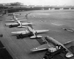  More details C-47 Skytrains unloading at Tempelhof Airport during the Berlin Airlift.