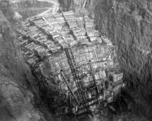Columns of Hoover Dam being filled with concrete, February 1934 (looking upstream from the Nevada rim). Bureau of Reclamation. Via Wikipedia.